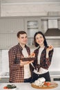 Beautiful couple spend time in a kitchen