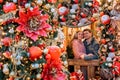 Beautiful couple standing on the doorstep of a beautifully decorated house. Royalty Free Stock Photo