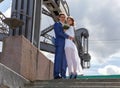 Beautiful couple standing on the stone bridge Royalty Free Stock Photo