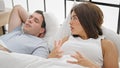 Beautiful couple suffering for snore at bedroom