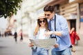 Beautiful couple traveling and sightseeing in new city Royalty Free Stock Photo