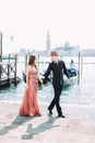 Beautiful couple in Venice, Italy - Lovers on a romantic date and kissing in Venice Royalty Free Stock Photo