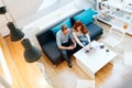 Beautiful couple working in a cosy living room Royalty Free Stock Photo