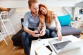 Beautiful couple working on laptop Royalty Free Stock Photo