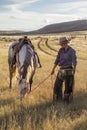 Beautiful Cowgirl With Horse