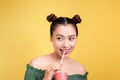 Beautiful crazy smiling asian woman girl with red lips drinking