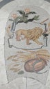 Marmer mosaic of a lion in la Galleria in Napoli on the floor