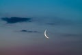 Beautiful crescent moon rising at dawn Royalty Free Stock Photo