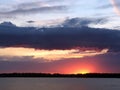 Beautiful crimson orange sunset on the river