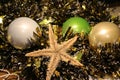 Beautiful Cristmas toys and sea star Royalty Free Stock Photo