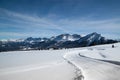 Beautiful cross country ski track in italian alps with epic mountain scenery Royalty Free Stock Photo