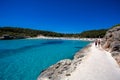 Beautiful crowded beach with turquoise water in summer season, Cala Modrago, Mallorca Royalty Free Stock Photo
