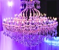 Beautiful Crystal Chandelier. Close up on the crystal of a contemporary crystal decoration. Luxury luster in the banquet hall. Gr Royalty Free Stock Photo