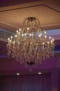 Beautiful crystal chandelier in a room Royalty Free Stock Photo