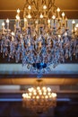 Beautiful crystal chandelier in a room Royalty Free Stock Photo