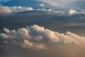 Beautiful cumulonimbus stormy rain cloud formations in Summer sunset sky with dramatic moody color and texture Royalty Free Stock Photo