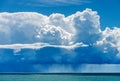 Beautiful Cumulus clouds and torrential rain over the sea - Liguria Italy Royalty Free Stock Photo