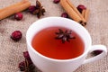 Beautiful cup of rosehip tea with anise Royalty Free Stock Photo