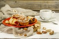 beautiful cupcakes with berries on wooden background in red plate Royalty Free Stock Photo