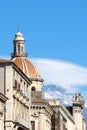 Beautiful Cupola of Saint Agatha Cathedral in Catania, Sicily, Italy captured on a vertical photo with famous volcano Mount Etna Royalty Free Stock Photo