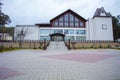 Beautiful curb appeal of a classic holiday home in Siberia with a beautiful front yard landscaping. Image of landscaping.