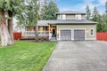 Beautiful curb appeal of a green siding home Royalty Free Stock Photo