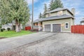 Beautiful curb appeal of a green siding home Royalty Free Stock Photo