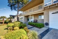 Beautiful curb appeal of two story house with beige exterior paint.