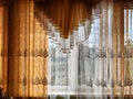 Beautiful curtains on the window with tulle, thick curtains and the sky in the background. Abstract texture, frame Royalty Free Stock Photo