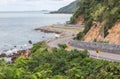 Beautiful curved road of Chalerm burapa chollathit road or scenic route beside the sea at Chanthaburi, Thailand