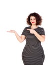 Beautiful curvy girl with striped dress indicating something wit