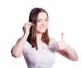 Beautiful customer service operator woman with headset Royalty Free Stock Photo