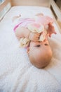 Beautiful cute baby girl in her crib Royalty Free Stock Photo