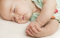 Cute little baby sleeping in a sweet sleep hugging a bear Royalty Free Stock Photo