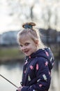 Beautiful cute little girl with a grimace on her face Royalty Free Stock Photo