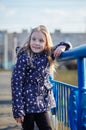 Beautiful cute little girl with a grimace on her face Royalty Free Stock Photo