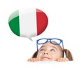 Beautiful cute little girl hiding under table and curiously looking at the Italy flag speech ballon above her head