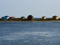 Beautiful cute little wooden beach huts summer houses, painted in lively colors, Aero Island, South Funen, Denmark