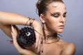 Beautiful cyber girl with black prickly ball