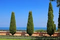 Beautiful cypress trees and flowers in the Bahai gardens overlooking the Mediterranean sea, Haifa, Israel Royalty Free Stock Photo