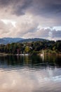 Beautiful Czorsztyn Lake. Sailboat leaving the marina. The bay at blue hour. Czorsztyn, Poland Royalty Free Stock Photo