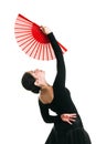 Beautiful dancer girl with a red fan