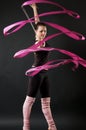 Beautiful dancer with pink ribbon Royalty Free Stock Photo