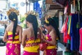 Beautiful dancers before to start their show in a traditional holiday in Bali, Indonesia. Beautiful young girls in traditional