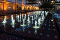 Beautiful dancing fountains at night as an abstract background , Nice