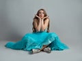 beautiful and daring princess in a lush blue Cinderella dress Royalty Free Stock Photo