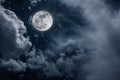 Night sky with bright full moon and cloudy, serenity nature background Royalty Free Stock Photo