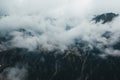 Beautiful dark moody scary mountain landscape in the fog