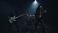 Beautiful dark moody shot of a rock band during a music video recording