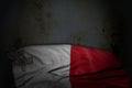 beautiful dark picture of Malta flag with large folds on rusty metal with empty place for text - any feast flag 3d illustration